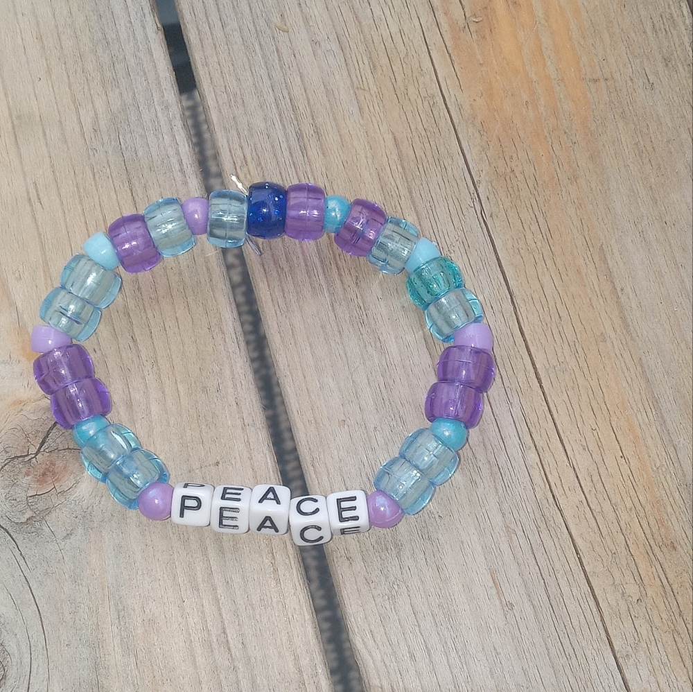 Handmade purple and blue peace bracelet